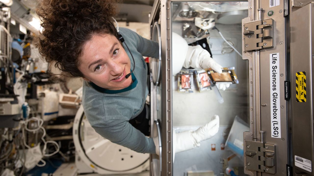 NASA astronaut Jessica Meir makes sure that bone samples remain nourished on the space station. 