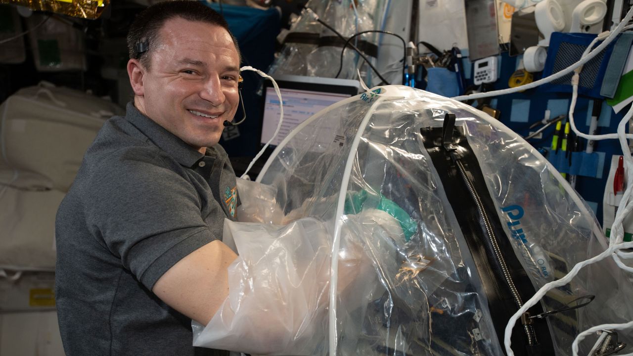 Morgan conducts cardiac research activities inside the portable glovebag. 