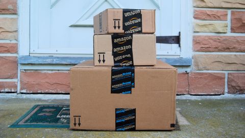 underscored amazon boxes at door