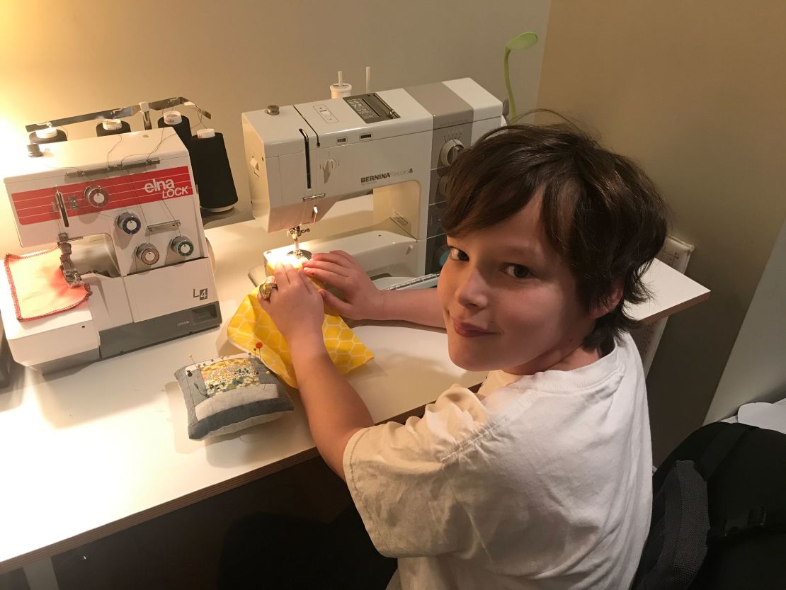 Christine Cox says her son has been helping her produce cloth masks for area hospitals
