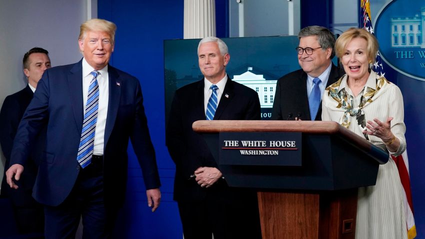 WASHINGTON, DC - MARCH 23: U.S. President Donald Trump (L) reacts to White House coronavirus response coordinator Deborah Birx (R) as she speaks at the daily coronavirus briefing at the White House on March 23, 2020 in Washington, DC. With the number of deaths caused by the coronavirus rising and foreseeable economic turmoil, the U.S. Congress continues to work on legislation for the nearly $2 trillion dollar aid package to deal with the COVID-19 pandemic. (Photo by Drew Angerer/Getty Images)