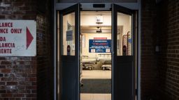 Doors lead into the Emergency Department at St. Barnabas Hospital on March 23, 2020 in the Bronx borough of New York City. As the number of confirmed cases and fatalities from the coronavirus (COVID-19) grow in New York, Governor Cuomo continues to urge President Trump to use the federal government to buy and distribute critical medical supplies. 
