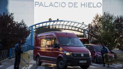 MADRID, SPAIN - MARCH 23: Members of the Military Emergency Unit (UME) in protective suits leave the mall Palacio de Hielo, whose ice rink will be used as a morgue due to local funeral homes being over capacity due to COVID-19 on March 23, 2020 in Madrid Spain. Spain plans to continue its quarantine measures at least through April 11. The coronavirus (COVID-19) pandemic has spread to at least 182 countries, claiming over 10,000 lives and infecting hundreds of thousands more. (Photo by Patricia J. Garcinuno/Getty Images)