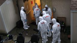 KIRKLAND, WASHINGTON - MARCH 12: A cleaning crew wearing protective clothing (PPE), enters the Life Care Center on March 12, 2020 in Kirkland, Washington. The nursing home in the Seattle suburbs has had the most coronavirus deaths of anywhere in the United States. (Photo by John Moore/Getty Images)