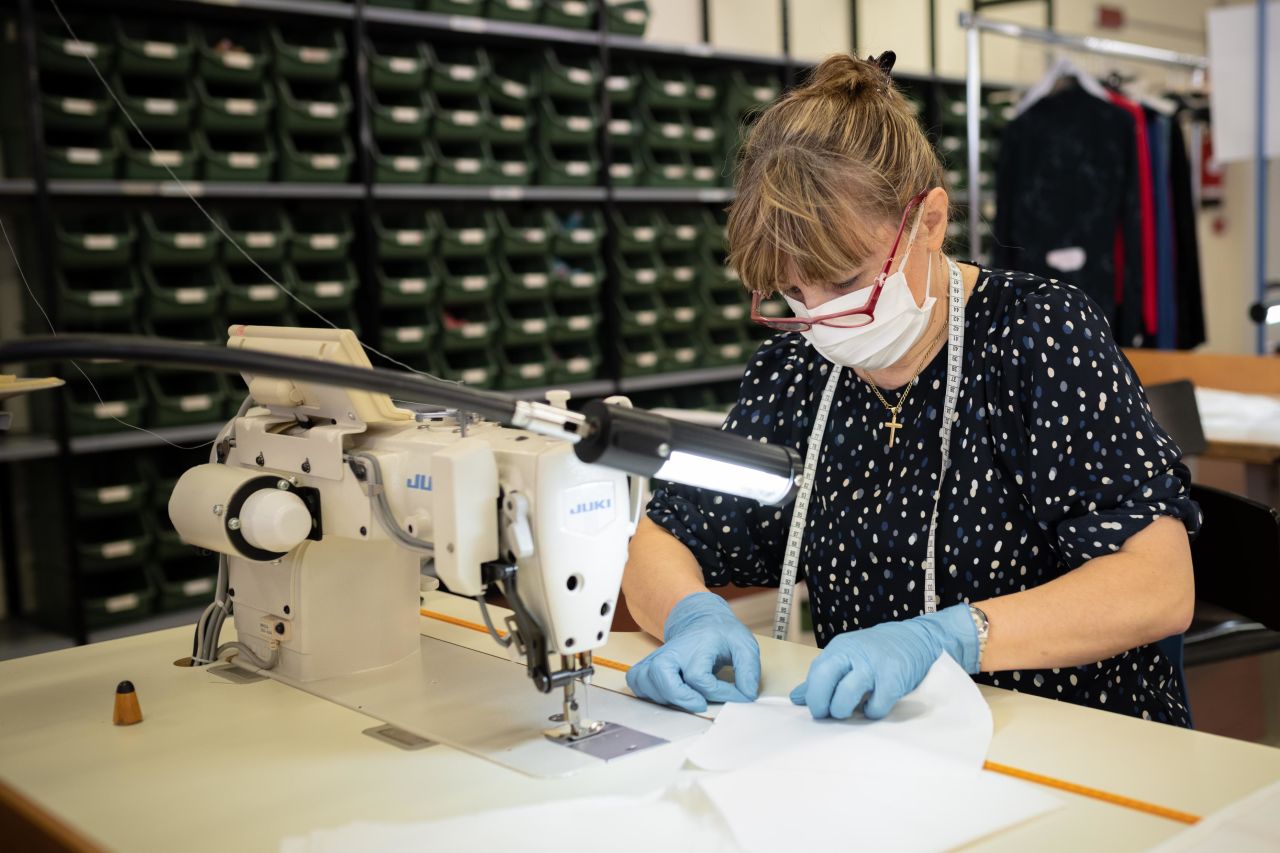 A worker sews a mask at a Miroglio Group factory in Piedmont, Italy