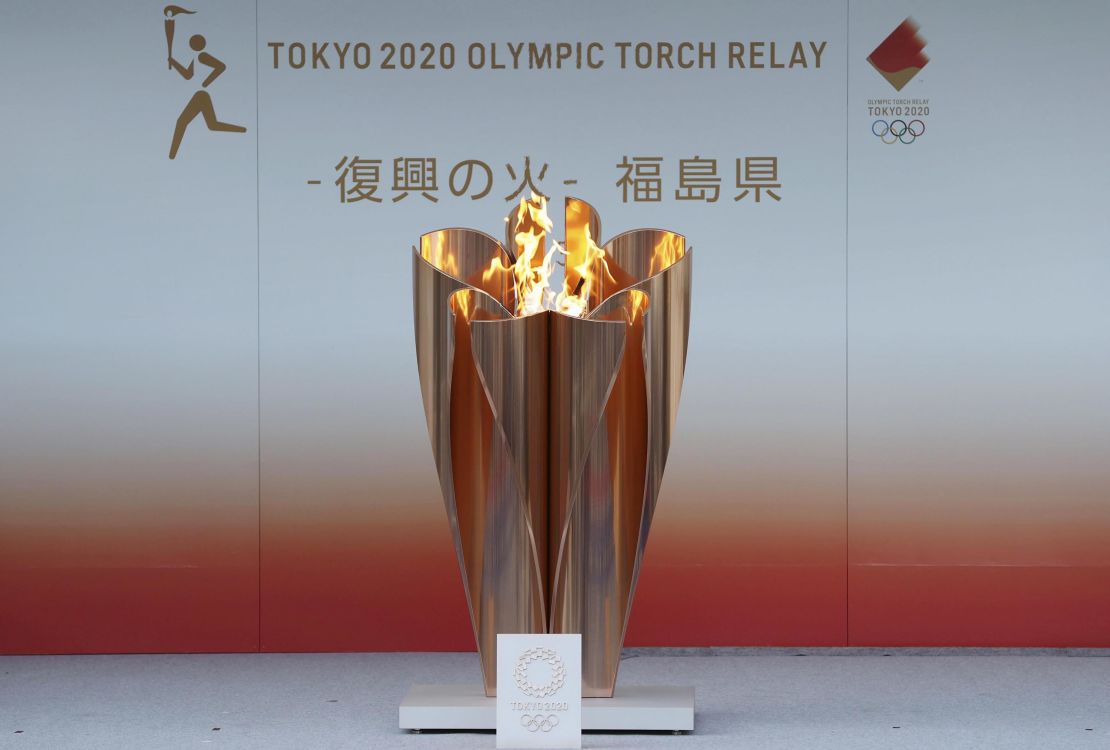 Photo taken March 24, 2020, shows the flame for this year's Tokyo Olympics exhibited in Fukushima. (Photo by Kyodo News via Getty Images)