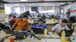 Employees work on laptop computers at the Flipkart Online Services Pvt. headquarters in Bengaluru, India, on Friday, Feb. 3, 2017.