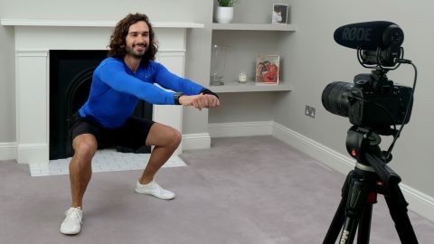 Joe Wicks, aka The Body Coach, teaches the UK's school children physical education live via YouTube on March 23 from his home in London. 