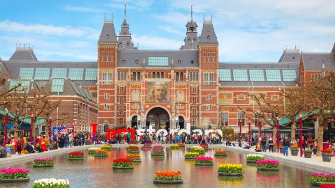 Amsterdam, Netherlands - April 16, 2015: I Amsterdam slogan with crowd of tourists in Amsterdam. Located at the back of the Rijksmuseum on Museumplein, the slogan quickly became a city icon.