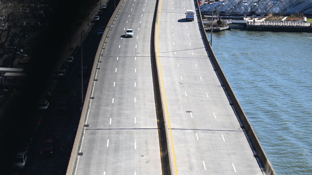 Light morning traffic seen on the FDR drive on March 24, 2020 in New York City. - US lawmakers closed in on a deal Tuesday to help save the teetering economy by injecting nearly $2 trillion into pockets of struggling Americans, devastated businesses and hospitals struggling to contain the coronavirus pandemic. (Photo by Angela Weiss/AFP/Getty Images)