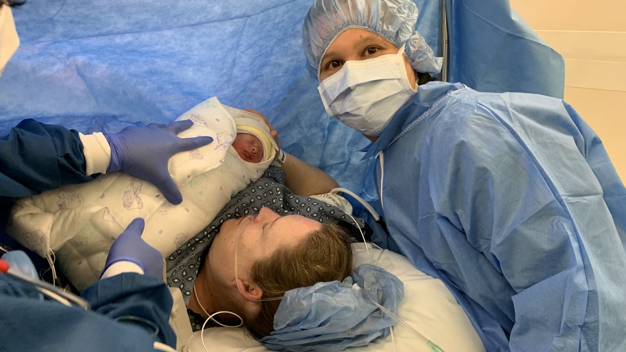 Juan and Kim Flores meet their baby boy, Nico, for the first time.