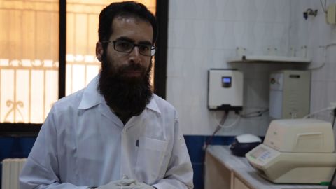 Dr. Mohammed Shahem Makki is the only person in Syria's rebel-held territories who can carry out tests. 
