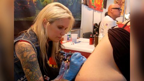 Michelle Myles, co-owner of Daredevil Tattoo in New York City, is one of the many shop owners who have donated protective supplies to hospitals. 