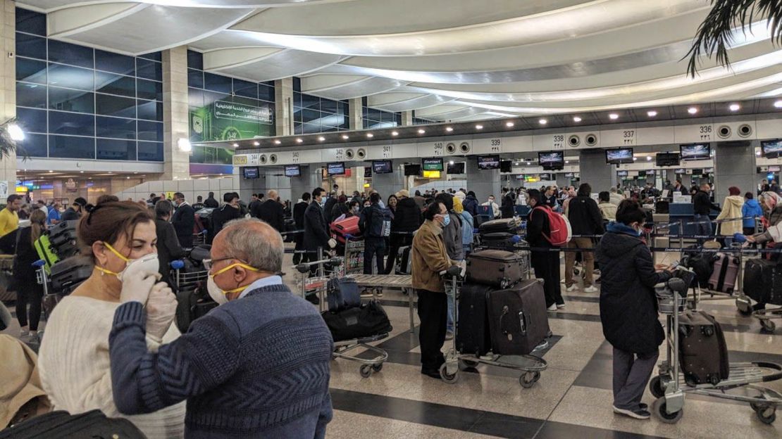 Check-in for the flight was crowded. Most passengers wore masks.