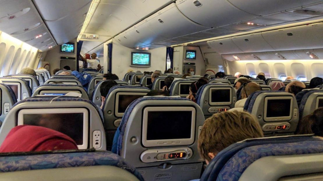 Departure was delayed by passengers anxious at being seated near the toilet.