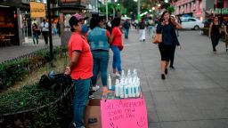 A street vendor sells antibacterial gek in a street of Mexico City on March 23, 2020, during the outbreak of the new coronavirus COVID-19. - The government of Mexico City imposed the closure of public spaces, as well as cinemas, bars, theatres and gyms to avoid contact between the population of the capital. (Photo by PEDRO PARDO / AFP) (Photo by PEDRO PARDO/AFP via Getty Images)