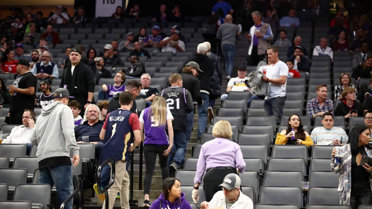 Fans exit after the Sacramento King game against the New Orleans Pelicans was postponed due to the corona virus at on March 11 in Sacramento, California.