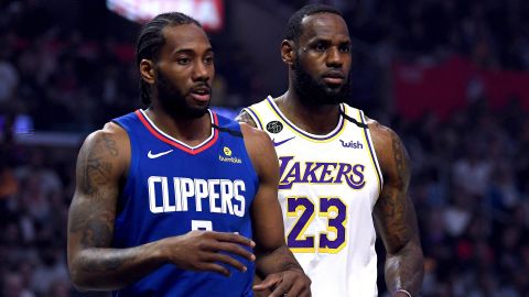 Kawhi Leonard #2 of the LA Clipper and LeBron James #23 of the Los Angeles Lakers during the first half at Staples Center on March 08, 2020 in Los Angeles, California.