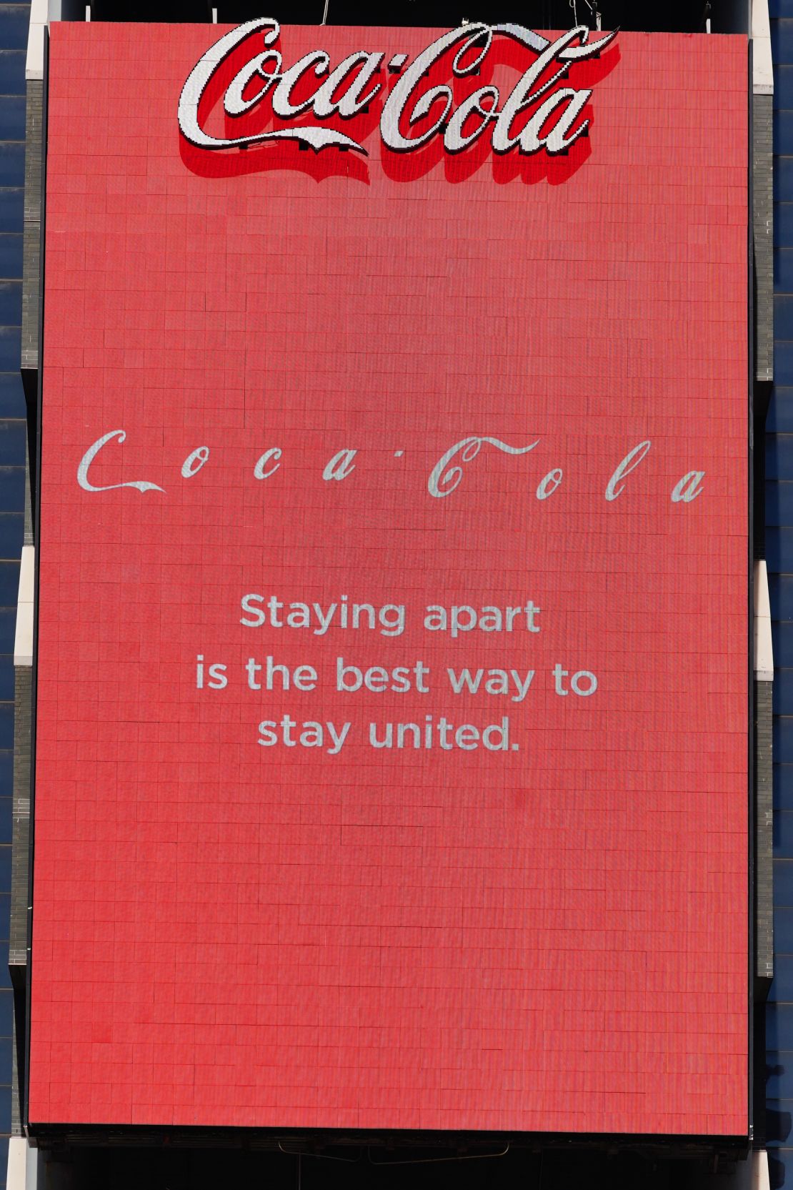 Coca-Cola's billboard in Times Square is promoting "Social Distancing" amid the coronavirus outbreak.
