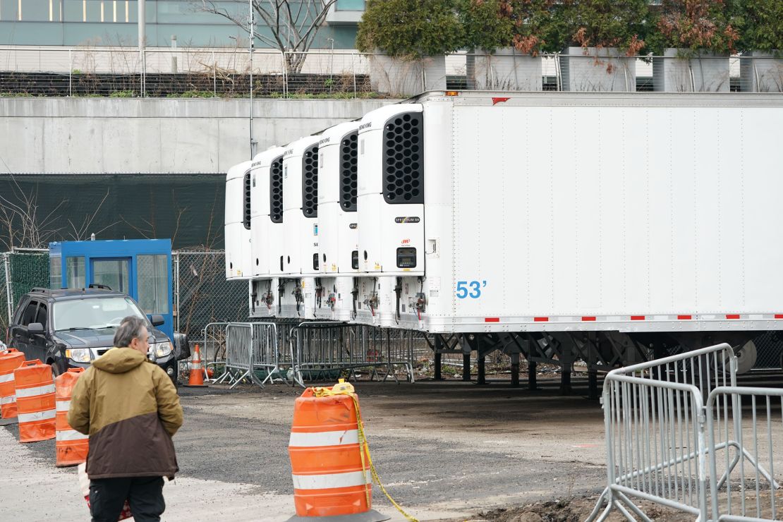 Refrigeration trucks at  a makeshift morgue outside Bellevue Hospital in Manhattan. 