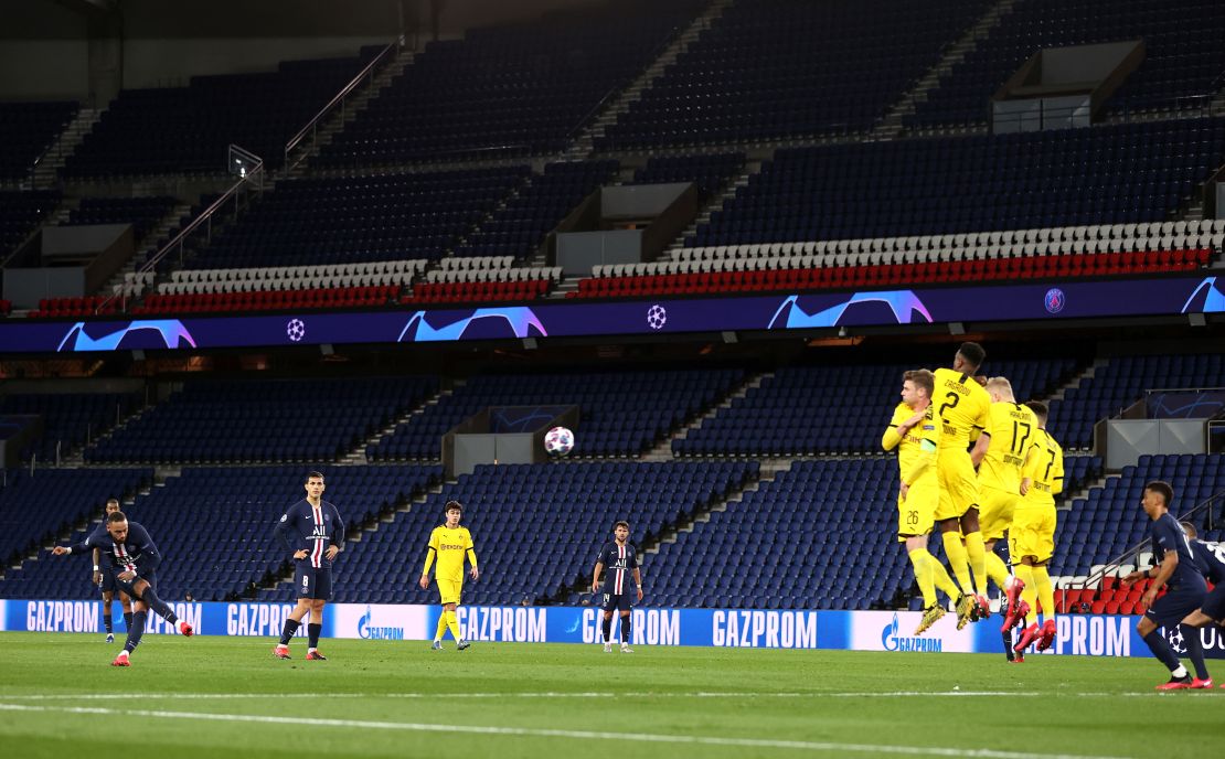 Neymar of Paris Saint-Germain takes a freekick during the UEFA Champions League round of 16 second leg match against Borussia Dortmund that was played behind closed doors as a precaution against the spread of Coronavirus.