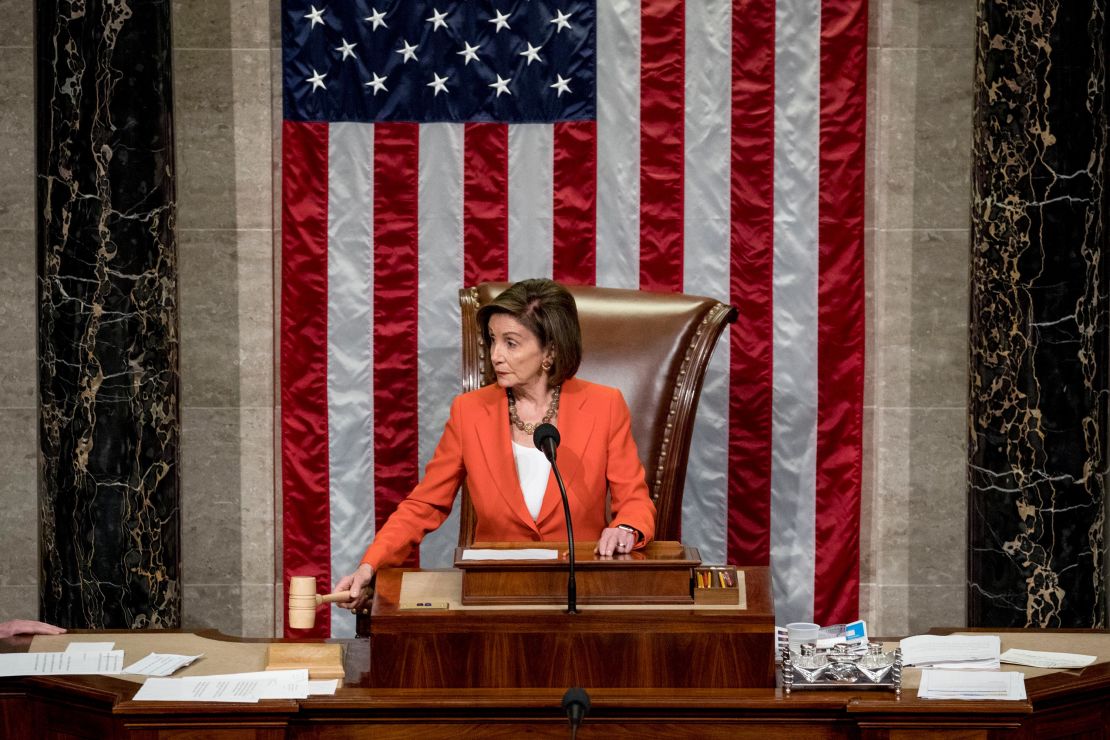 House Speaker Pelosi gavels as the House votes 232-196 to pass a resolution on impeachment procedure to move forward into the next phase of the impeachment inquiry into President Trump on October 31, 2019.