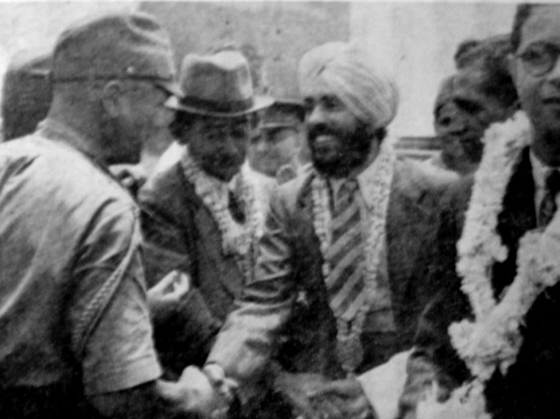 Japanese Major Fujiwara Iwaichi greets Captain Mohan Singh of the Indian National Army.