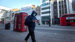 A man wearing a protective face mask during rush hour on the Strand in Westminster, London after Prime Minister Boris Johnson put the UK in lockdown to help curb the spread of the coronavirus. (Photo by Victoria Jones/PA Images via Getty Images)