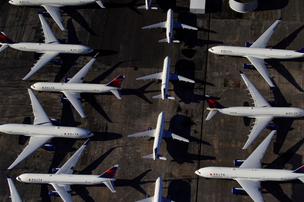 Passenger jets from Delta Air Lines are parked in Birmingham, Alabama, on Wednesday, March 25. Air travel has been scaled back dramatically because of the coronavirus pandemic.