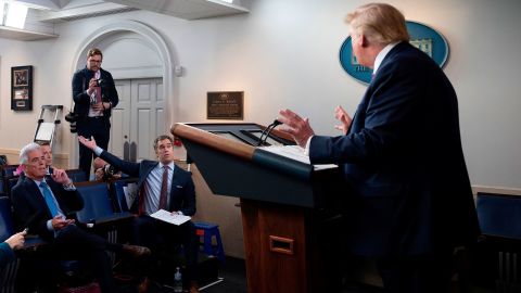 Trump ripped into NBC News' Peter Alexander, seated, during a White House coronavirus briefing in March 2020. Alexander had asked Trump whether he was giving Americans "false hope" by touting unproven coronavirus drugs. Toward the end of the exchange, Alexander cited the latest pandemic statistics showing thousands of Americans are now infected and millions are scared. Alexander asked, "What do you say to Americans who are scared?" Trump shook his head. "I say that you are a terrible reporter," he replied. "That's what I say." The President then launched into a rant against Alexander, NBC and its parent company, Comcast. "You're doing sensationalism," Trump charged. 