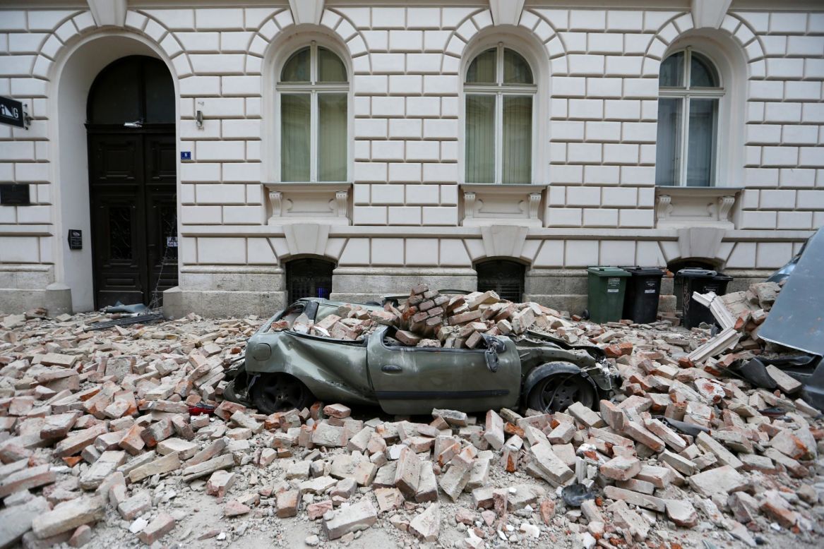 A car is destroyed in Zagreb, Croatia, after an earthquake on Sunday, March 22.