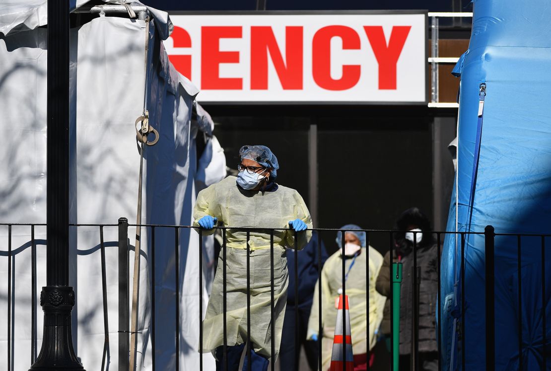 Medical workers outside at Elmhurst Hospital Center in the Queens borough of New York City on March 26, 2020. 