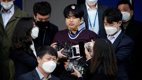 Cho Joo-bin, who allegedly ran an online sexual blackmail ring, walks out of a police station as he is transferred to a prosecutor's office in Seoul, South Korea, on March 25.  