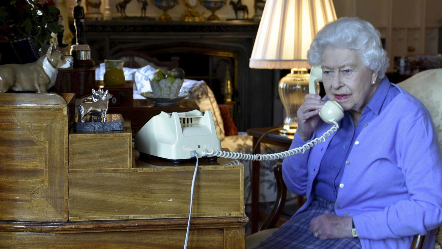 Britain's Queen Elizabeth II speaks to UK Prime Minister Boris Johnson from Windsor Castle on Wednesday, March 25, 2020, for her weekly audience.