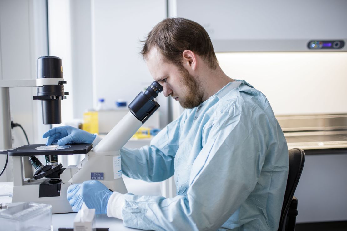 A researcher works on a vaccine against the new coronavirus at the Copenhagen University research lab in Denmark on March 23, 2020.
