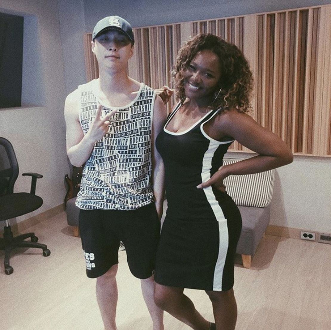 Chikk (right) with Lay of K-pop group EXO. 