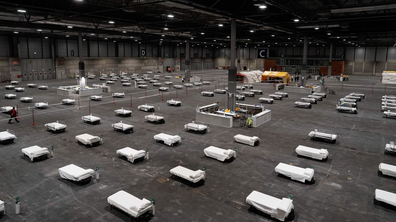 Health workers prepare to receive the first coronavirus patients at Ifema exhibition complex in Madrid on March 22.