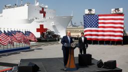 President Donald Trump speaks in front of the U.S. Navy hospital ship USNS Comfort at Naval Station Norfolk in Norfolk, Va., Saturday, March 28, 2020. 