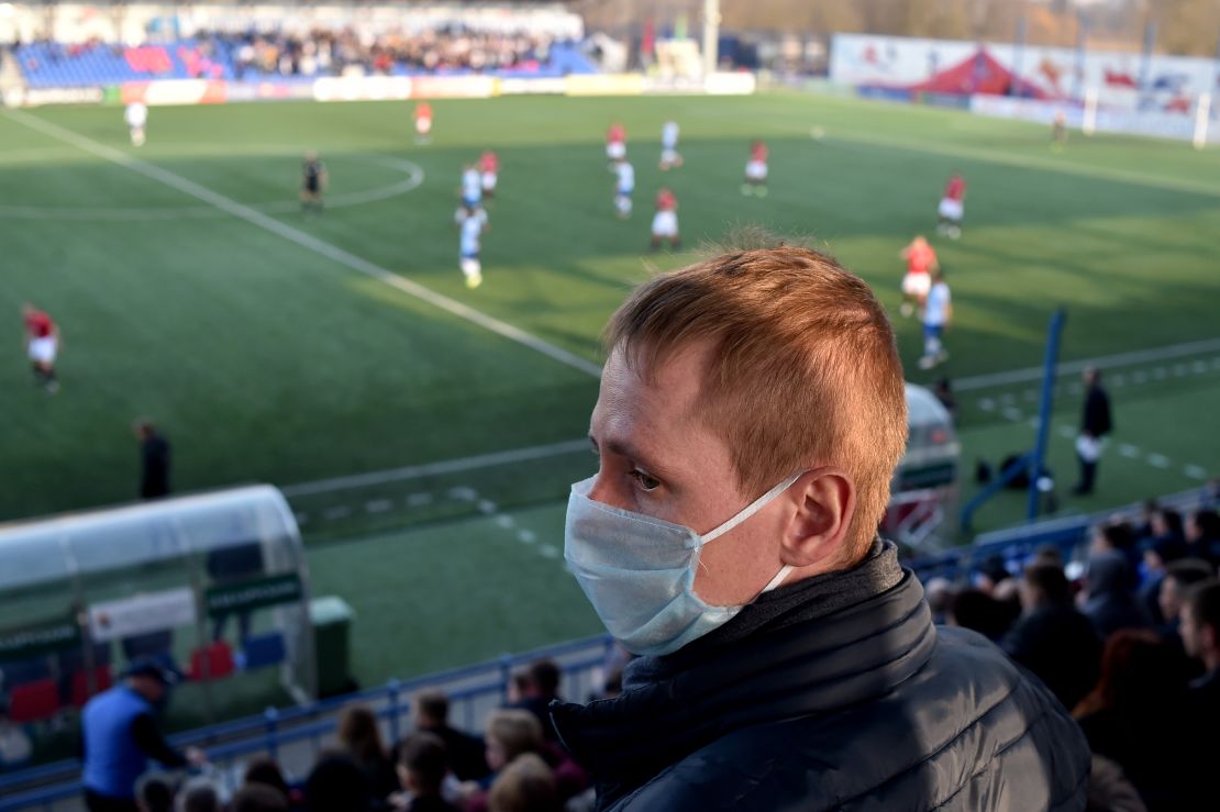 Few supporters wore protective face masks to the match.
