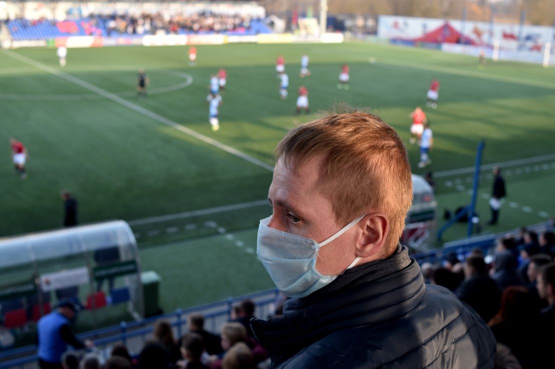 Few supporters wore protective face masks to the match.