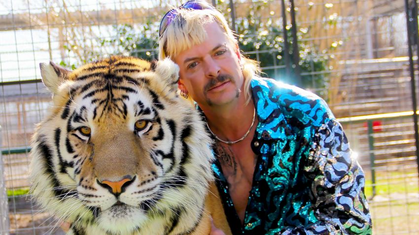 Joseph Maldonado-Passage aka Joe Exotic and one of his cats in the Netflix docuseries "Tiger King: Murder, Mayhem and Madness."