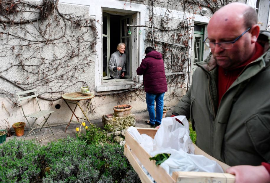 Farmers deliver vegetables to a customer in Saint-Georges-sur-Cher, France, on March 29, 2020.