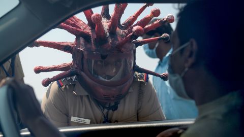 Artist B. Gowtham created the coronavirus helmet, which was then used by police inspector Rajesh Babu in Chennai, India.