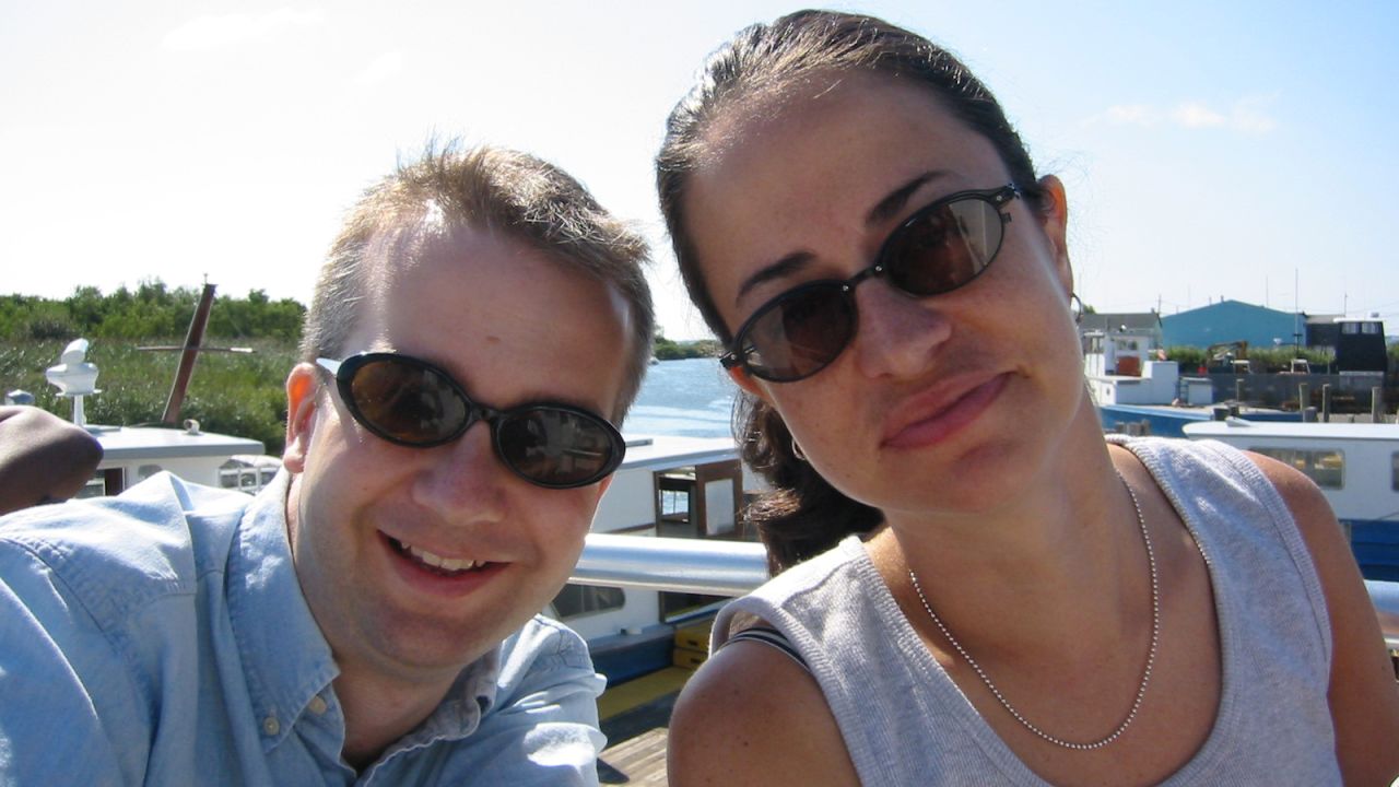 <strong>One Pines summer: </strong>Senior Producer Katia Hetter (right) with longtime friend Thom Geier, now executive editor of The Wrap, sitting on the dock at Fire Island's Pines community in 2002.