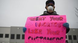 Amazon workers at Amazon's Staten Island warehouse strike in demand that the facility be shut down and cleaned after one staffer tested positive for the coronavirus on March 30, 2020 in New York. - Amazon employees at a New York City warehouse walk off the job March 30, 2020, as a growing number of delivery and warehouse workers demand better pay and protections in the midst of the COVID-19 pandemic. (Photo by Angela Weiss/AFP/Getty Images)