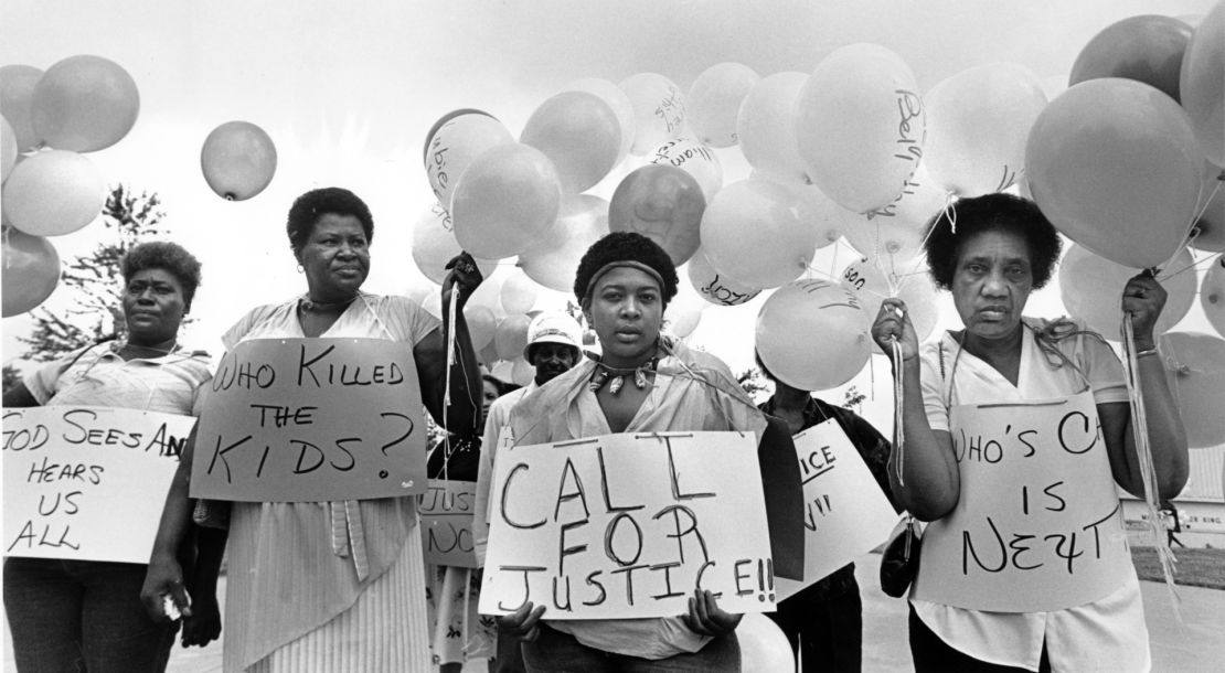 Evelyn Miller, Willie Mae Mathis, Sheila Baltazar and Annie Hill, mothers of the missing and murdered kids of Atlanta, prepare for a second annual memorial march in 1984. (Courtesy of Georgia State University/AP/HBO)