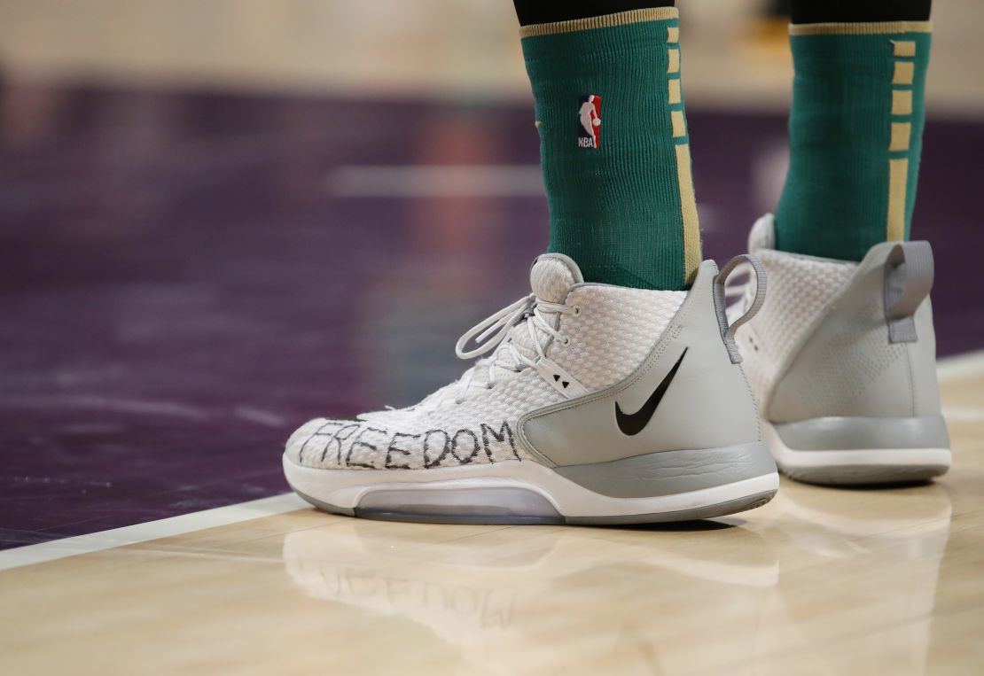 Kanter takes the court with the word "freedom" written on his shoes during the Boston Celtics away game against the Los Angeles Lakers on February 23.