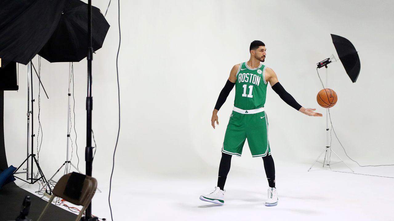 Enes Katner poses for photos during a Celtics media day last year.