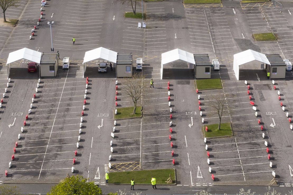 Drive-through testing tents have been set up in an empty parking lot at Chessington.