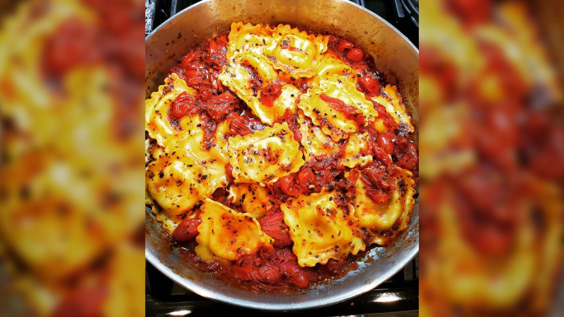 James Winston created this lobster ravioli with a burst cherry tomato sauce and basil. With fewer trips to the grocery store, he said he finds himself experimenting more. "I'm trying to get creative and mix recipes and see how they turn out," he said.